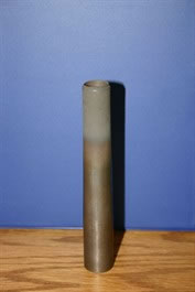 Thermal-sprayed portion of aerator tine to reduce abrasive wear